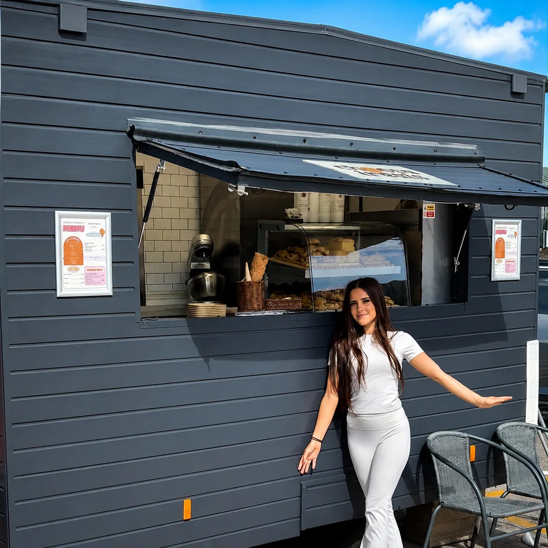 Izzy outside the Chocca Treats trailer at Vibes Gym in Shefford